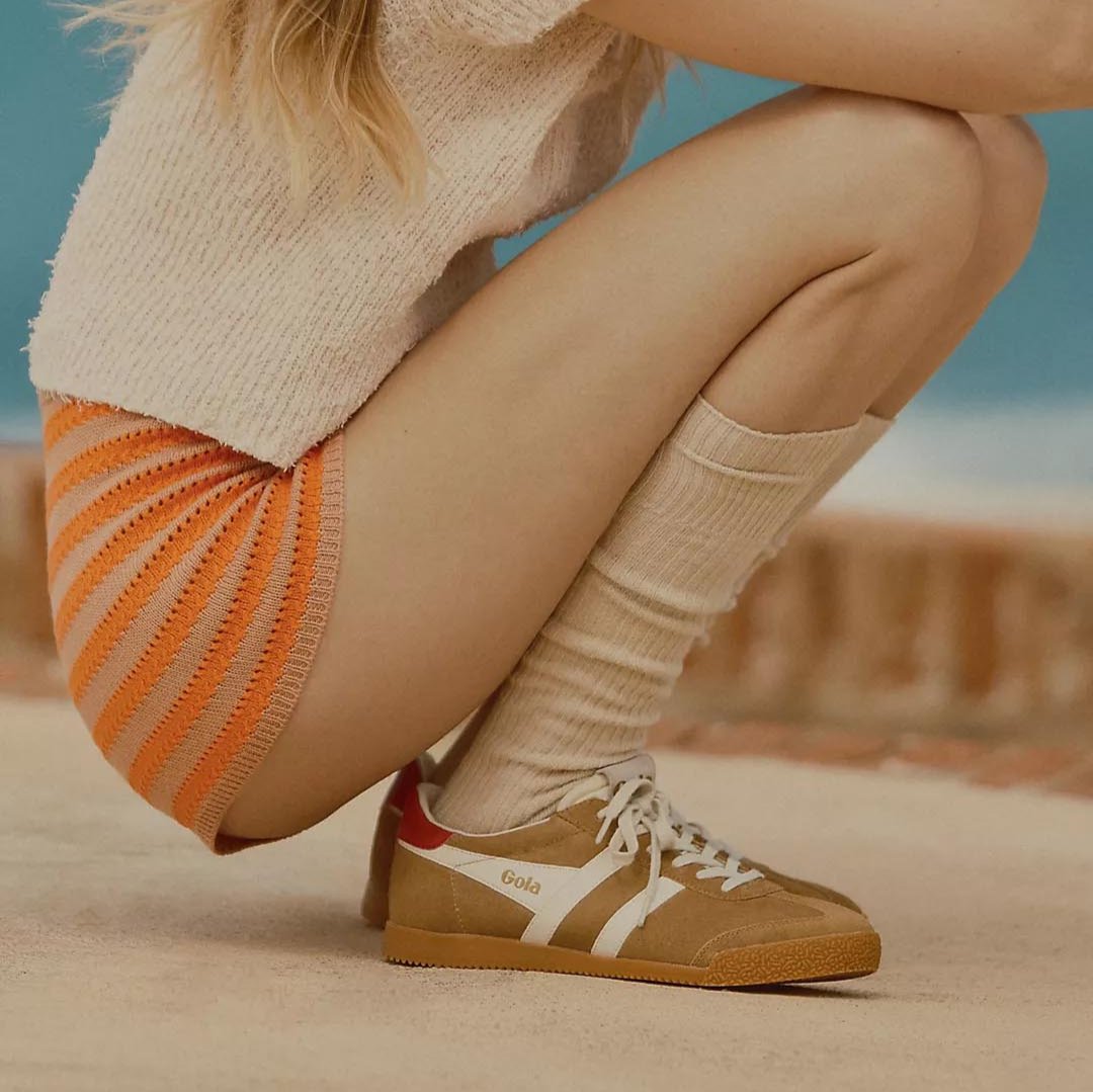 Gola Elan sneaker in sand caramel suede with white stripes and red heel accent