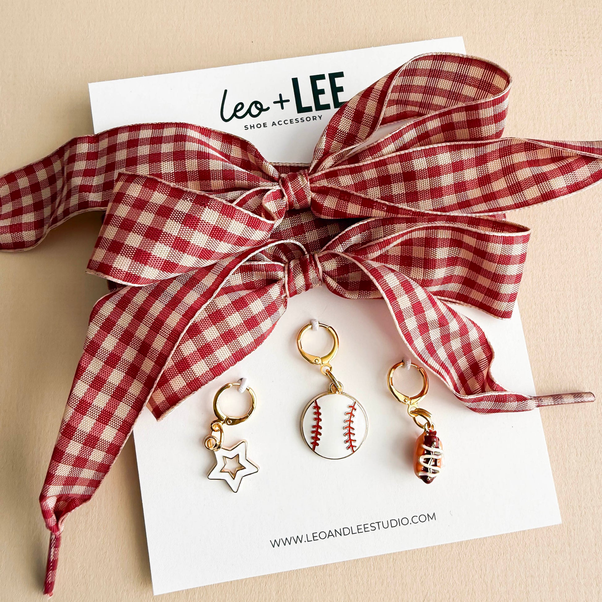 Close-up of sneaker lace charms with baseball design