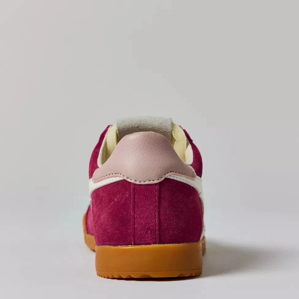 back view of Gola women’s magenta suede retro sneakers with gum sole and white leather stripes