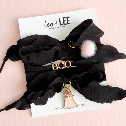 Black ribbon sneaker lace set with BOO letters, pom-pom, and ghost charm