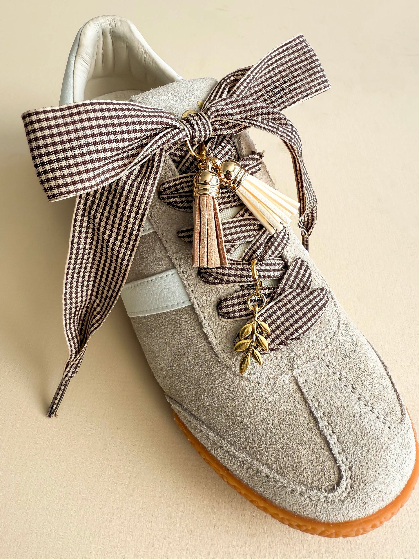 Fall-themed lace charm set with ribbon laces and tassel accents