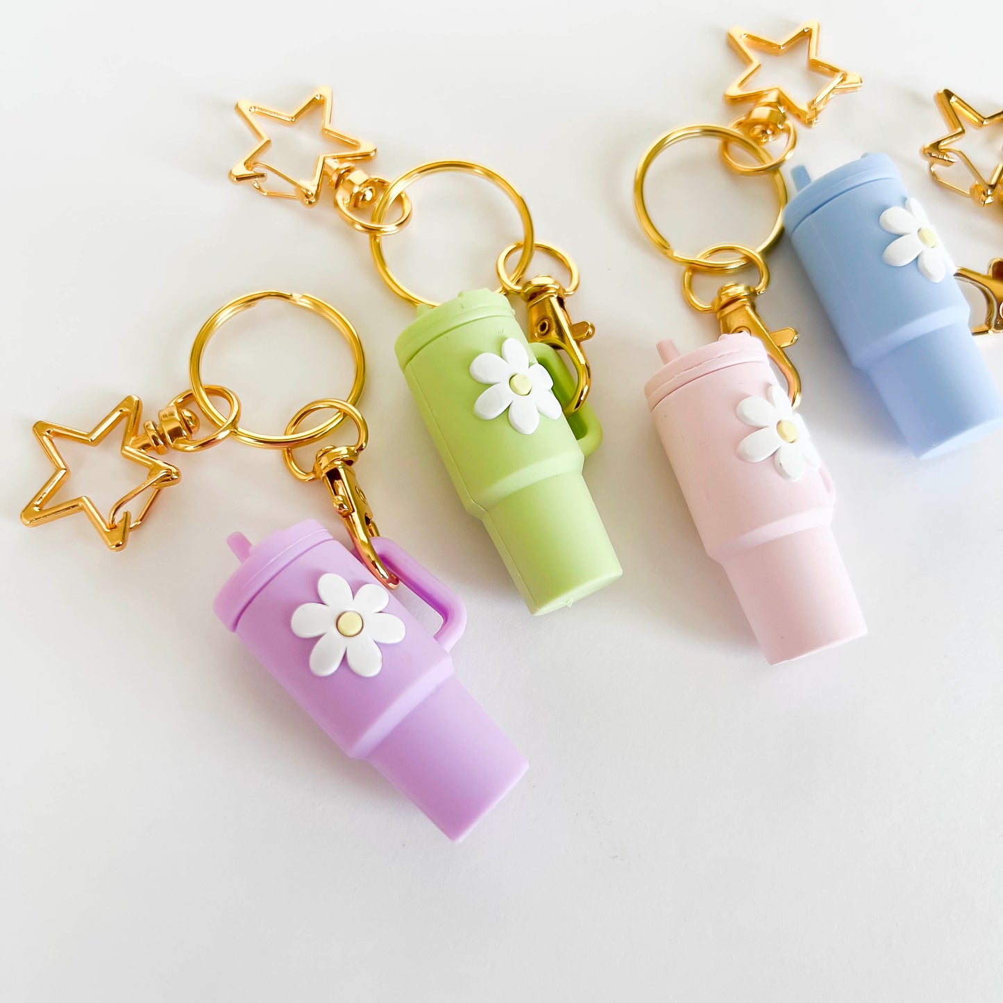 Pastel mini Stanley cup keychain with flower charm and gold star keyring