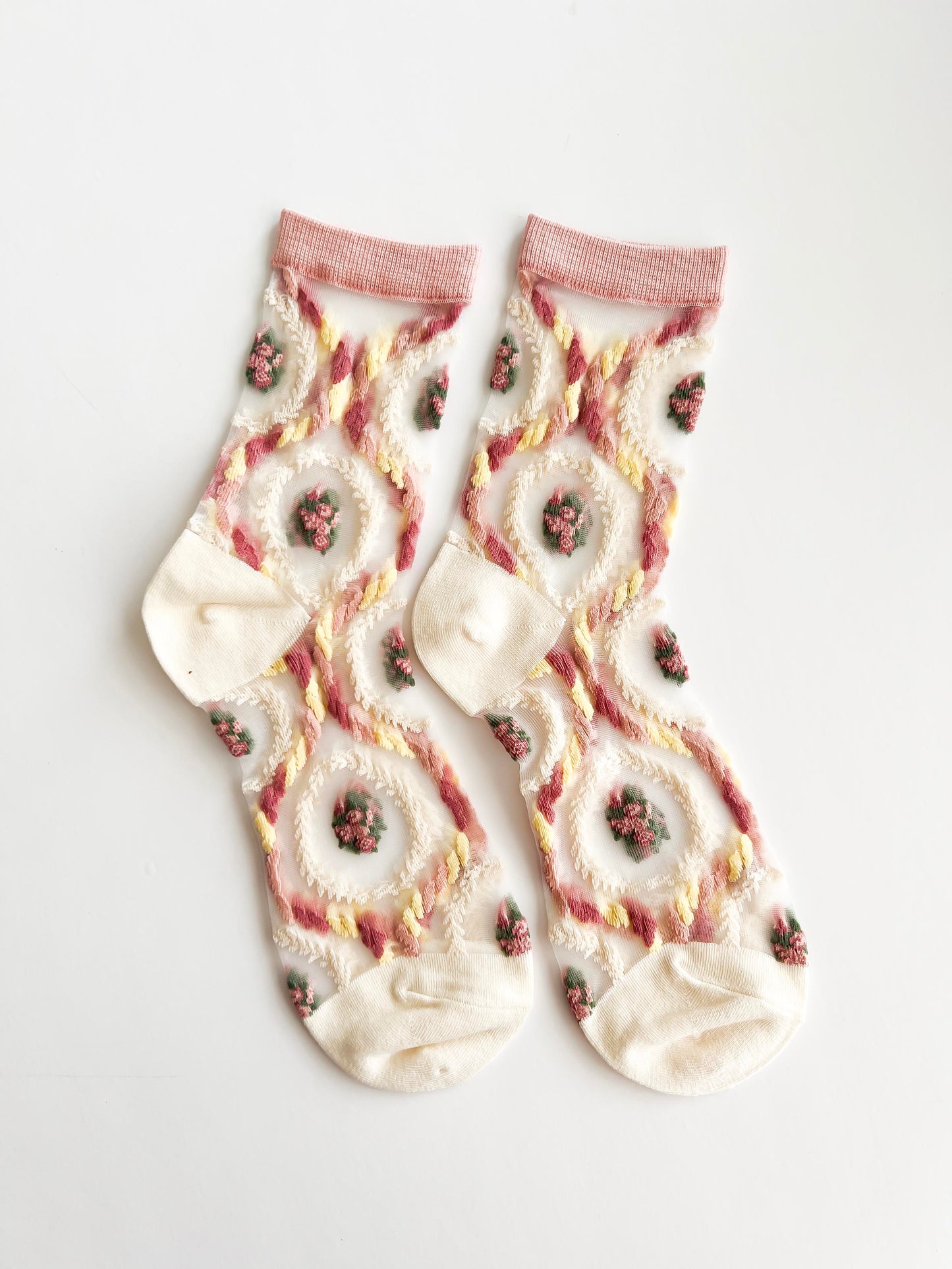 Transparent lace socks with a delicate blue bow and coral ruffled trim, stylish and breathable