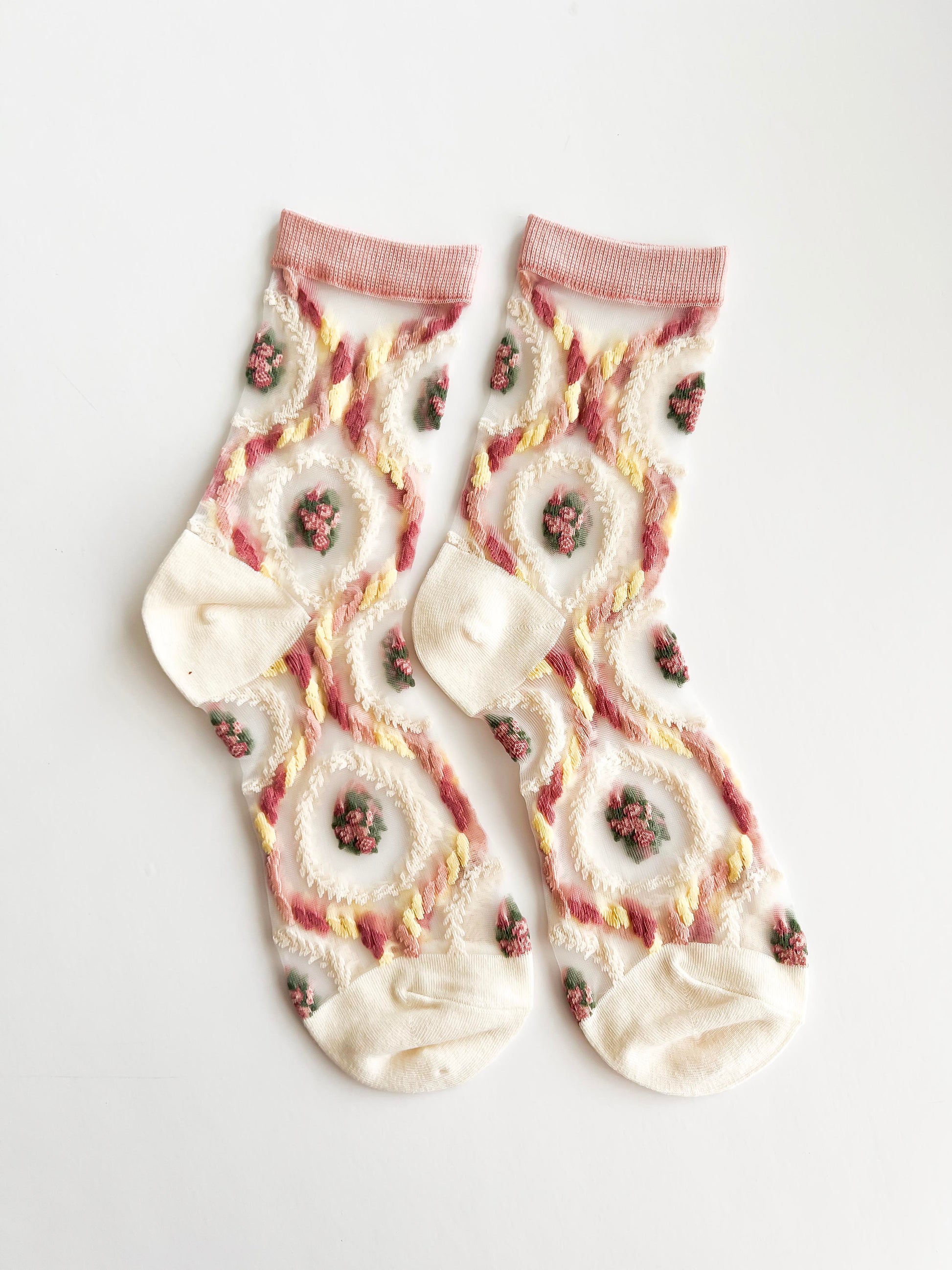 Transparent lace socks with a delicate blue bow and coral ruffled trim, stylish and breathable