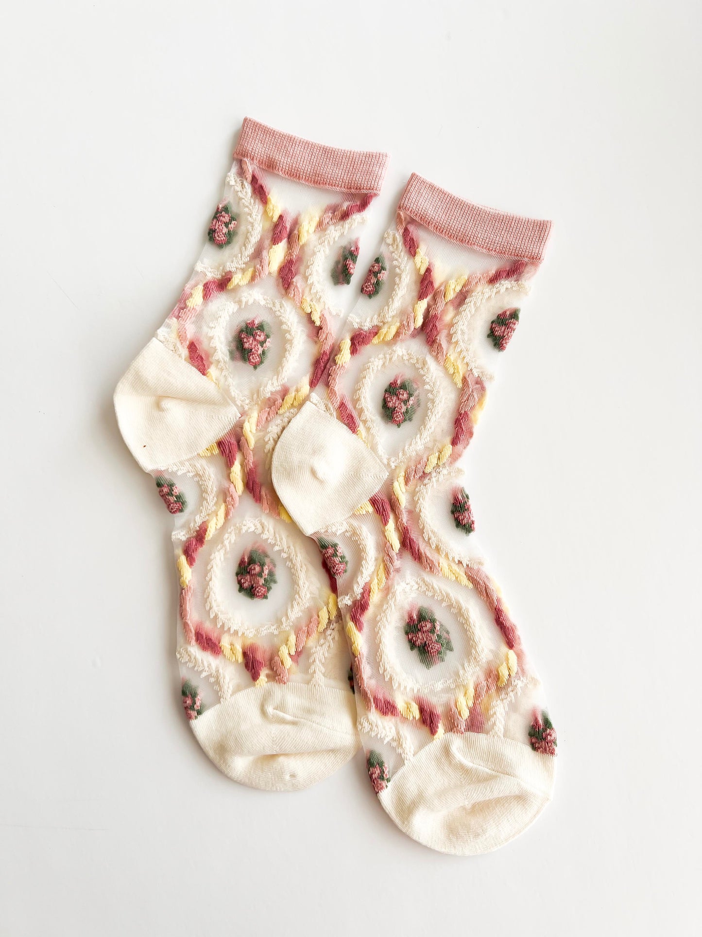 Transparent lace socks with a delicate blue bow and coral ruffled trim, stylish and breathable