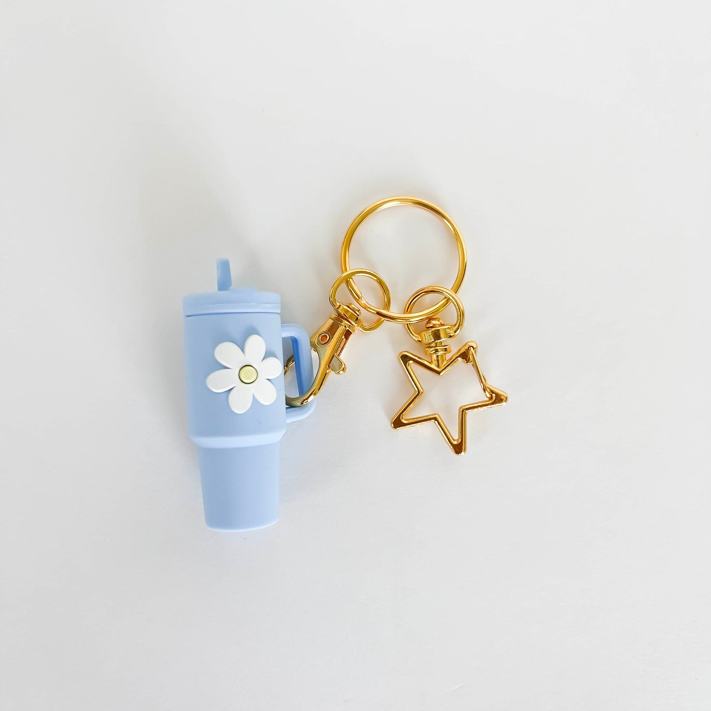 Sky blue mini Stanley cup keychain with flower charm and gold star keyring