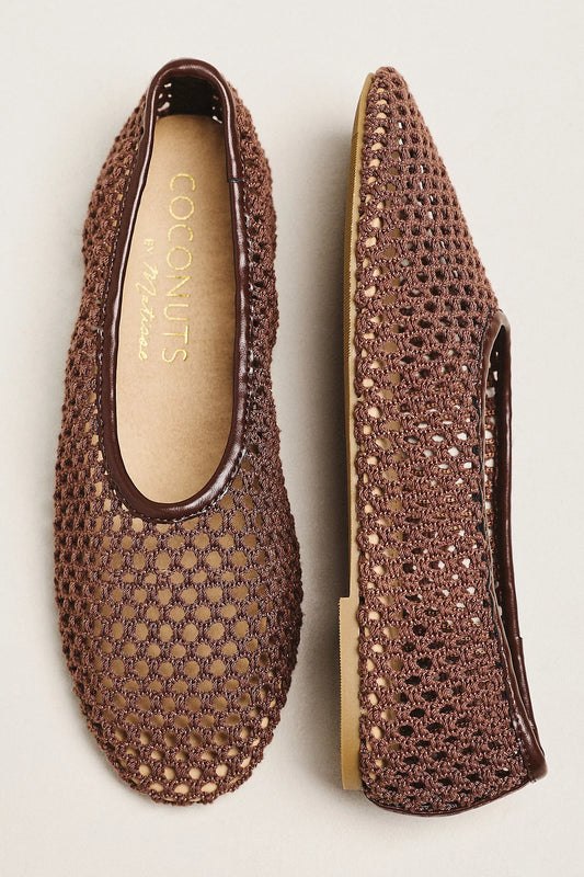 Pair of brown open-toe shoes with textured pattern on a white background