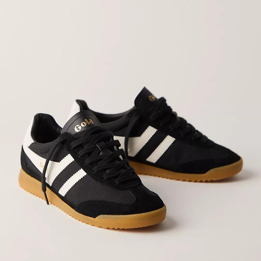 a black gola Torpedo sneaker with white strtipes and a retro gum sole with black laces