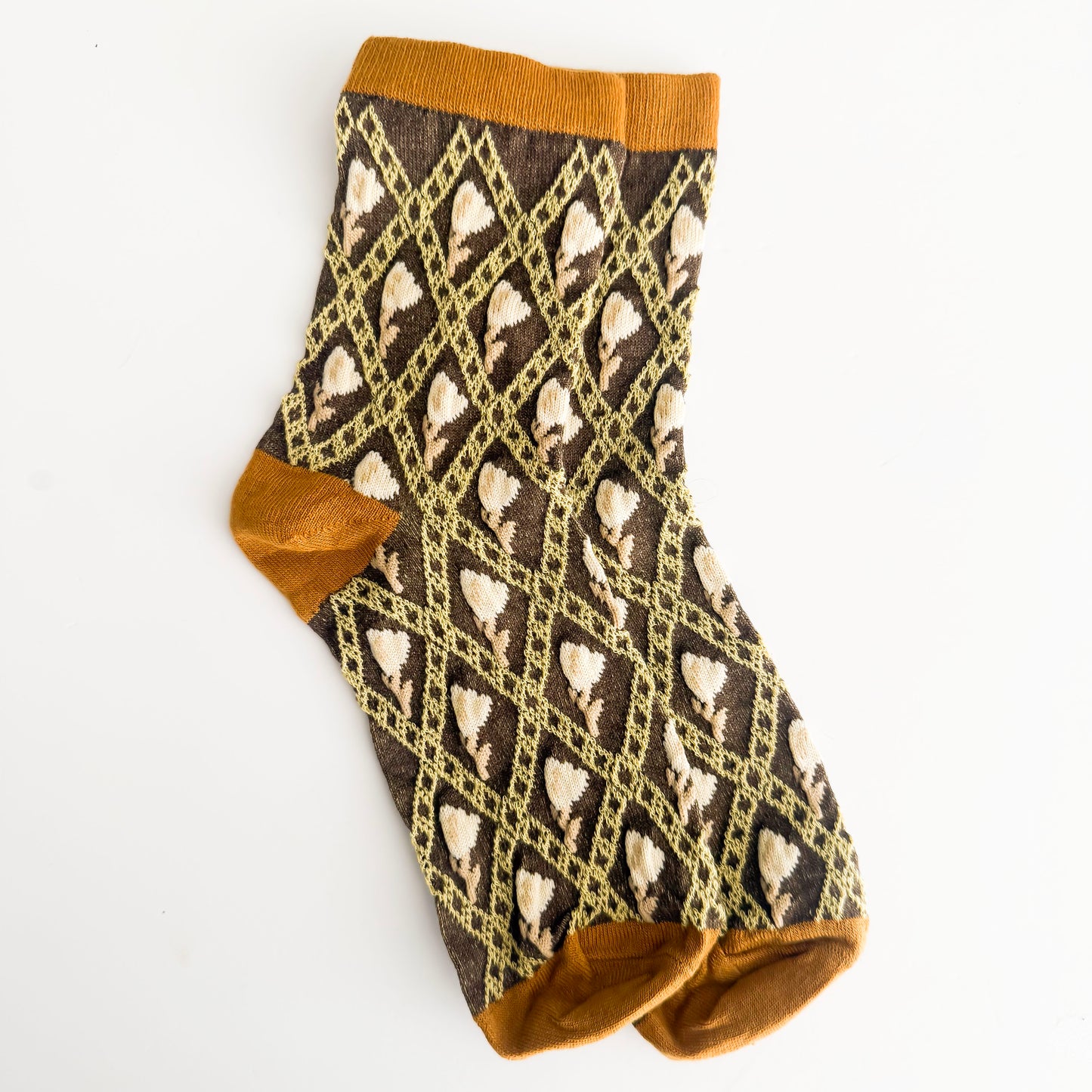 Sock with geometric pattern on a white background
