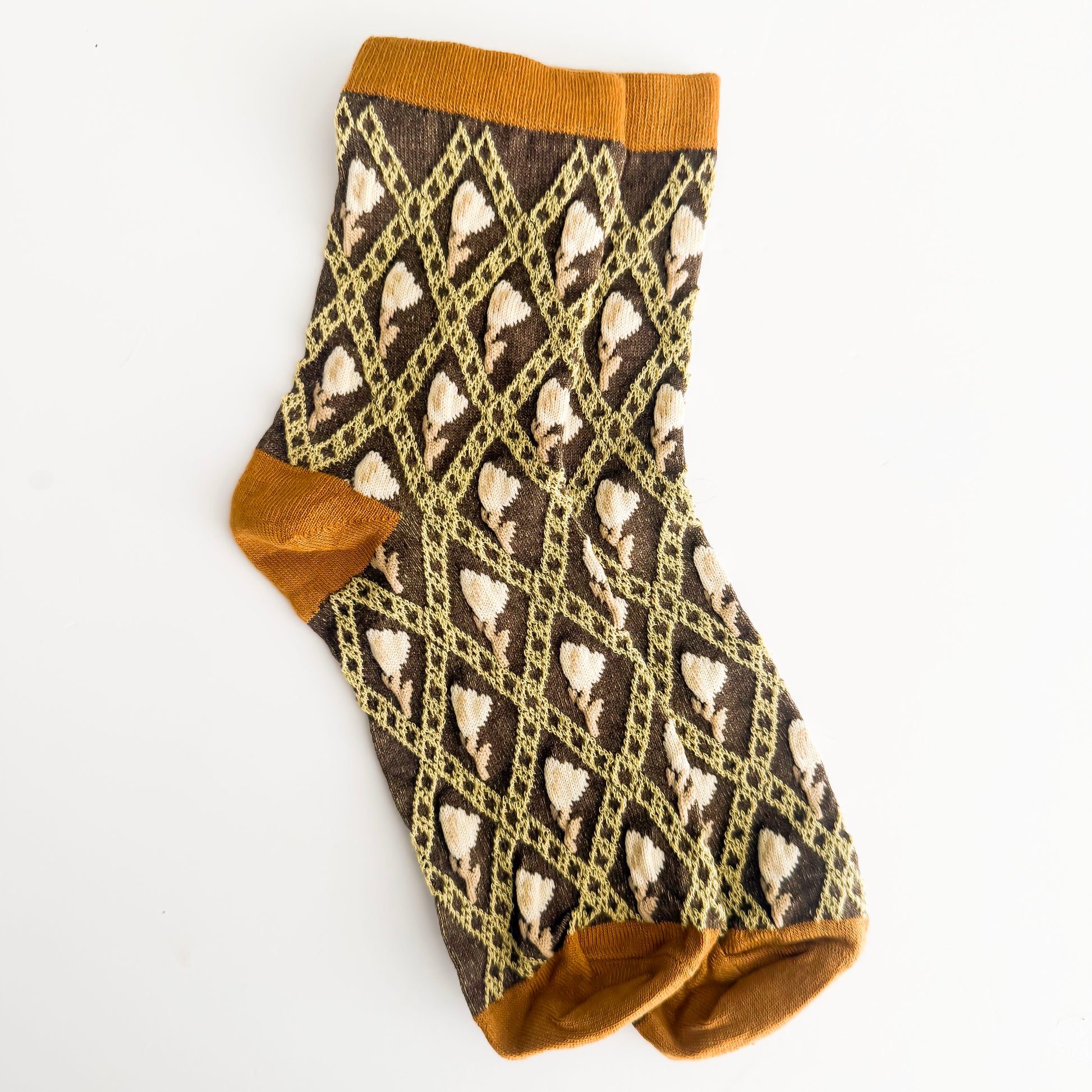 Sock with geometric pattern on a white background